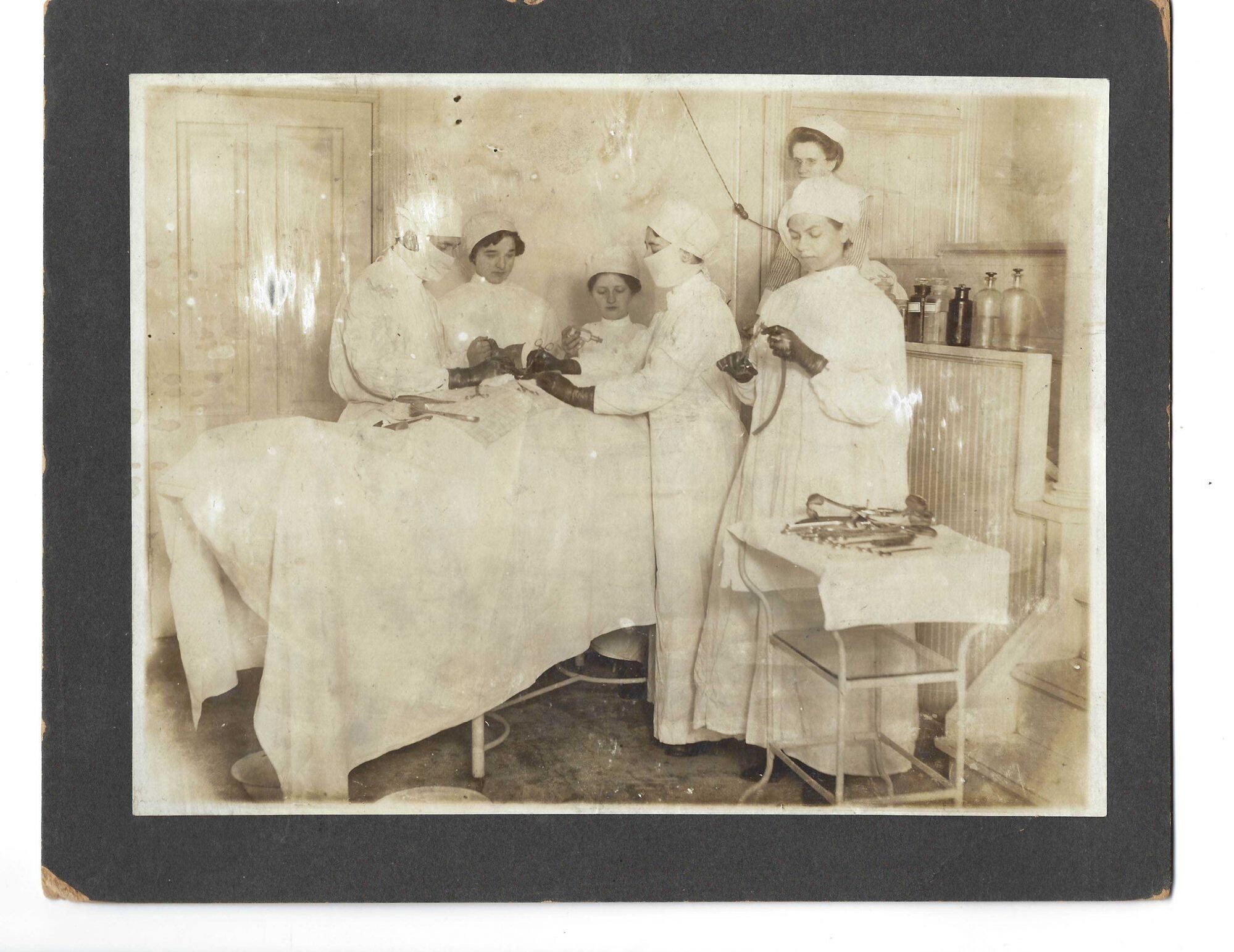 Woman Surgeon And Medical Team Perform Operation Circa 1920 Women woman-surgeon-and-medical-team-perform-operation-circa-1920-women